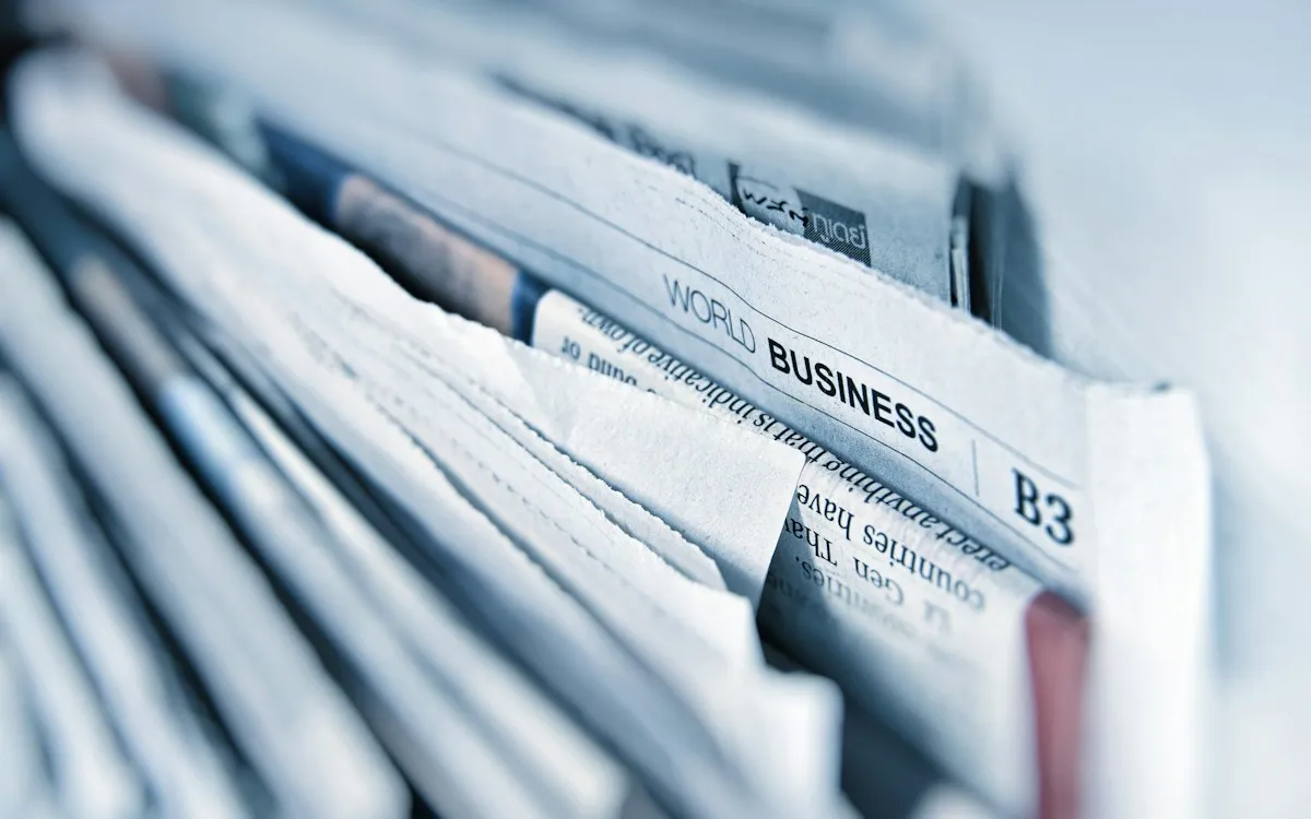 Close-up of a stack of folded newspapers
